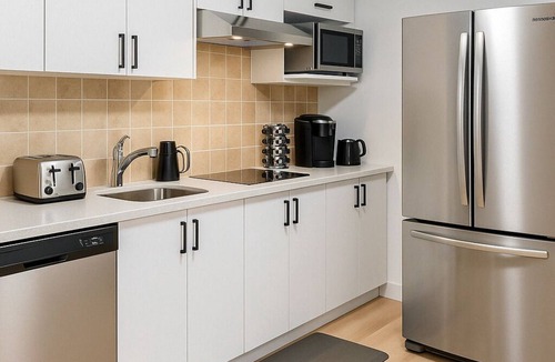 Airdrie Apartment | Walk-Out Comfort