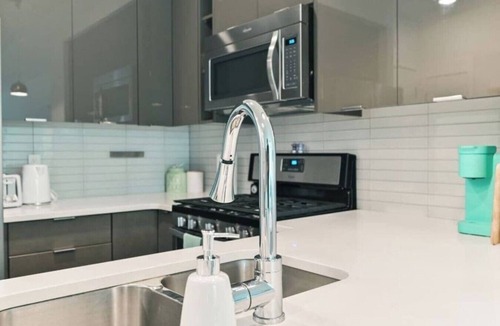Southwest Calgary Apartment | WALK to Saddledome| "The Aqua" | AC