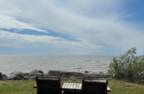 Saint Laurent Cottage | Water's Edge cedar cabin on 1 acre lakefront: a perfect retreat summer or winter