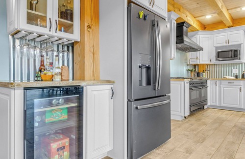 Wicomico Church House | Waterfront 4-bedroom homestead with pool, jacuzzi, and dock access. Sleeps 11!