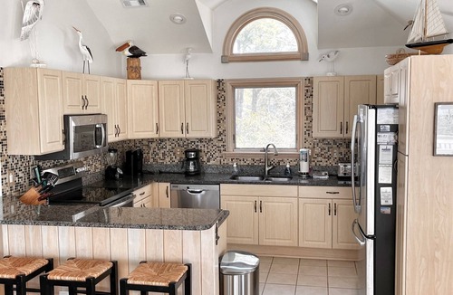 Corolla Light House | Waterfront Home in Corolla | Sleeps 12 | Private Pool Hot Tub | Dog-Friendly