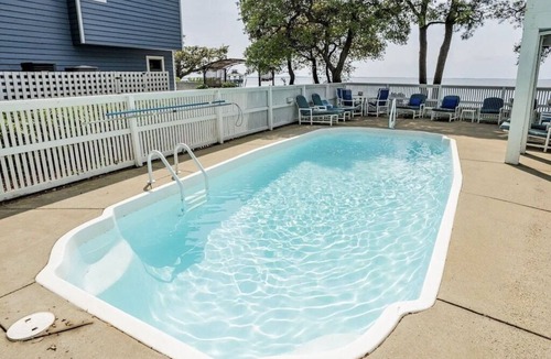Corolla Light House | Waterfront Home in Corolla | Sleeps 12 | Private Pool Hot Tub | Dog-Friendly