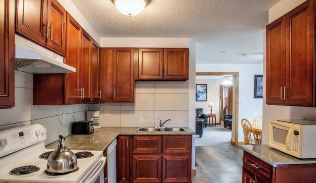 4-Bedroom Apartment at Blue Mountain · Walk to Village · Private Beach Access