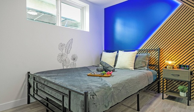 A fun, family friendly lower suite close to WEM with a game room, creative themed rooms, full kitchen, fenced yard & easy parking.