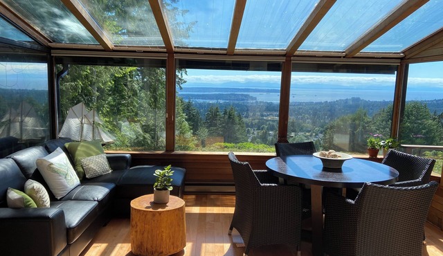 A VIEW FROM EVERY ROOM! A PEACEFUL, NATURAL SETTING WITH A HOT TUB!