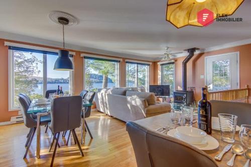 Aux Berges du Pont Suspendu - Chalet Île privée Spa Bord du lac - Estrie