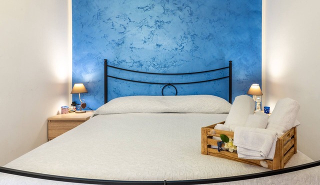 B&B Nodo Francescano - Blue Room with Balcony, Wi-Fi and Air Conditioning