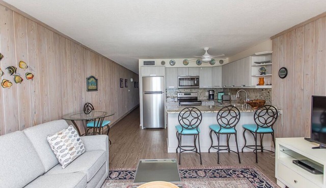 BRIGHT AND CHEERY TWO BEDROOM OCEAN FRONT CONDO STEPS AWAY FROM THE OCEAN!