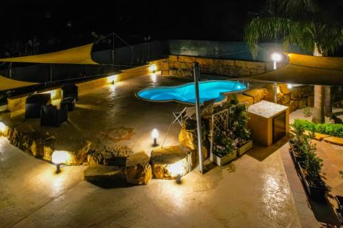 Casale Sammartano - Appartamenti con piscina comune