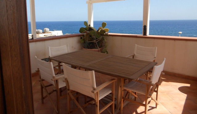 Charming airplane house by the sea with terrace