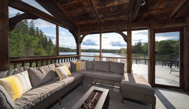 Charming Cottage- lakefront, hot tub, snowmobiling