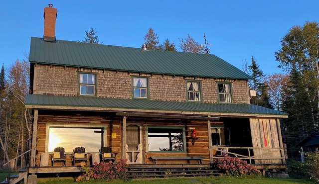 Classic Canadian Log home on a private lake, with acres to explore!