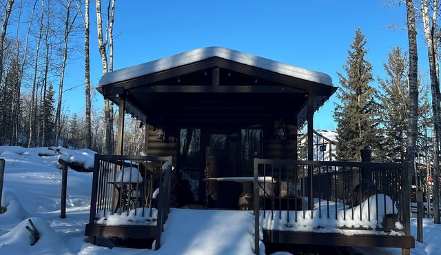 Cozy, secluded cabin with stunning private garden and large covered deck.
