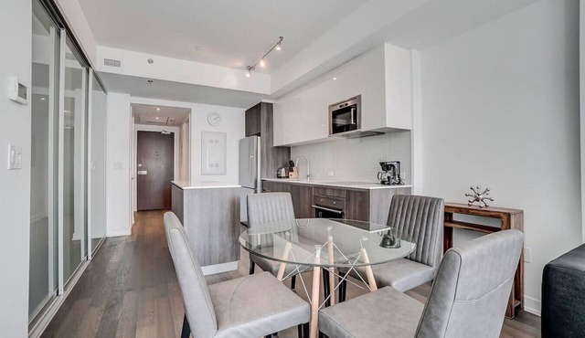 Downtown 2BR Gem with Balcony and Skyline Views