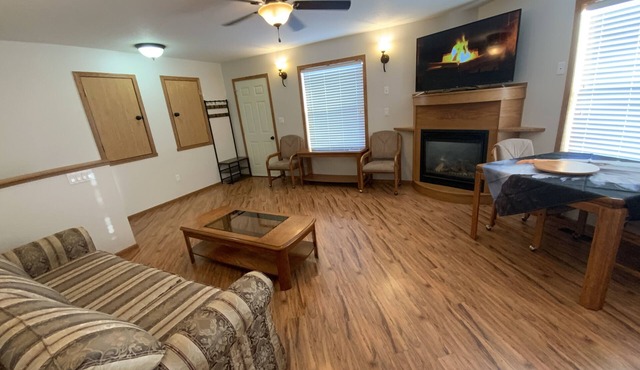High End King Suite c/w Living room, 2 Fireplaces, 2 Smart TVs, Kitchenette.