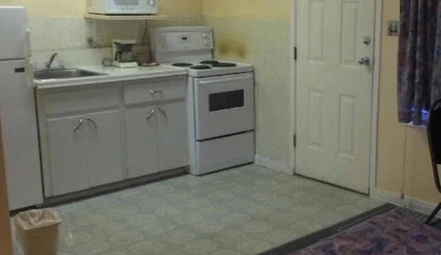 Kitchenette with in room modem hardwired internet.