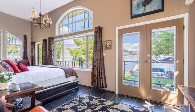 Lake Front Downtown Kelowna home With beautiful dock