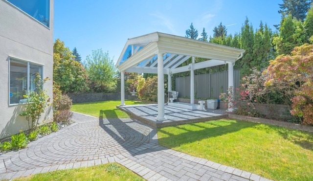 Large fully renovated 2-bedroom ground-level suite with a fenced backyard