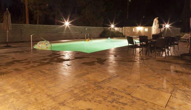 Licensed Kelowna Retreat with pool and pickleball, private midtown acreage