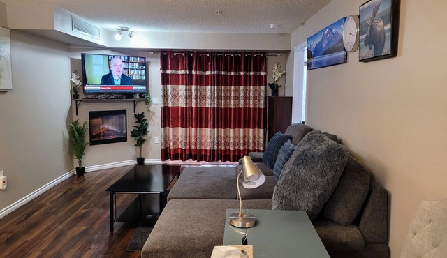 Loaded secure 2 bed 2 bath condo with parking, near Roger's Stadium Downtown