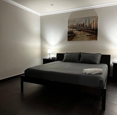 Luxury Vancouver Suite Near Skytrain with Direct Access to YVR & Downtown