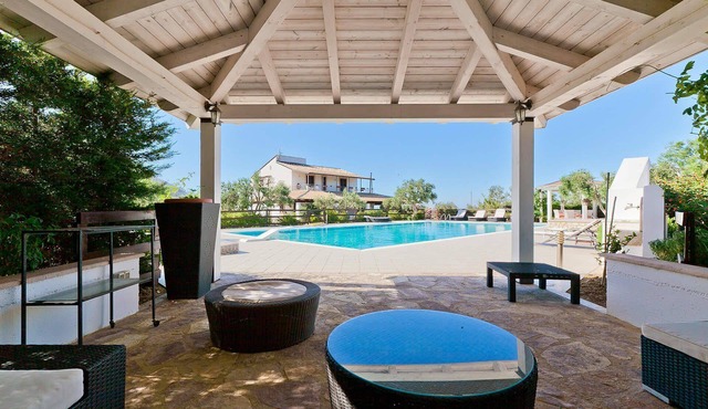 My Rental Homes - Villa Ophelia, surrounded by lush vegetation with swimming pool
