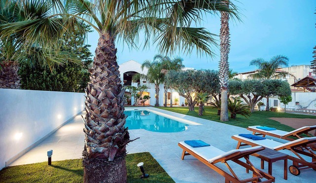 My Rental Homes - Casa Tika with shared pool surrounded by a wonderful garden