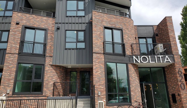New 1-bedroom furnished condo with AC in charming Cultural District of Kelowna