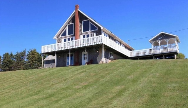Oceanfront PEI Home with Ocean Views, Wraparound Deck & Private Beach
