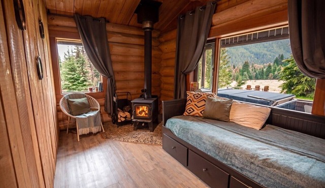 Off-Grid Wilderness Cabin with Mountain Views, Hot Tub, Sauna & Canoes