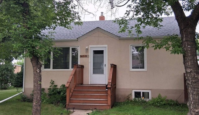 Quiet corner lot 3 Bedroom house, unfinished basement with private backyard.