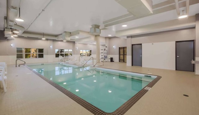 Relax and Unwind in Affordable Room with Swimming Pool and Free Shuttle