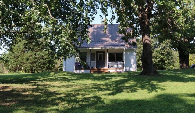 Renovated charming cape on a 72 acre retired farm