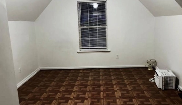 Simple, clean, and spacious 4 bedroom house with a stairlift.