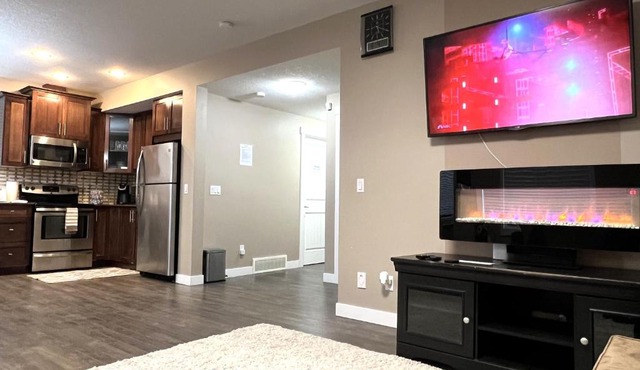 Spacious Private Cozy Walkout Entire Suite Close to Airport, Downtown, Shops, Stampede & Rocky Mountains with many Amenities in Panorama Hills NW - 4 Can Sleep