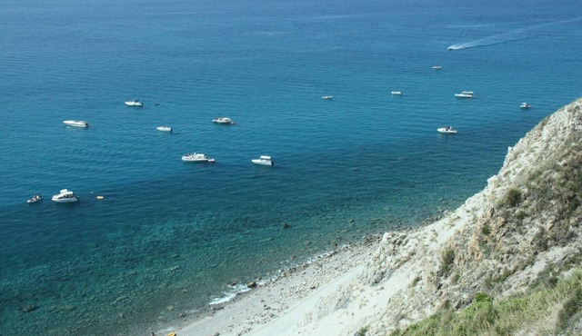 Vacation Home "Oasi Azzurra - Bilocale Standard-102" with Shared Pool & 2 Shared Terraces