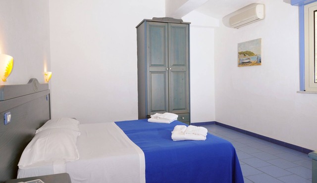 Vacation Home "Oasi Azzurra - Bilocale Plus 1" with Sea View, Shared Pool & Shared Terraces