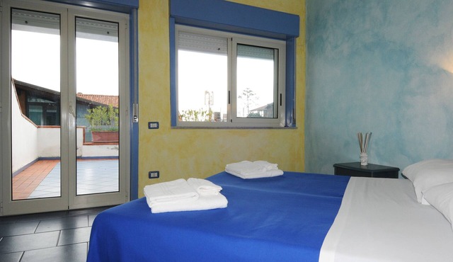Vacation Home "Oasi Azzurra - Trilocale Plus 1" with Sea View, Shared Pool & Shared Terraces