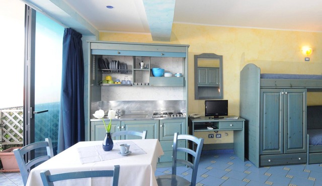 Vacation Home "Oasi Azzurra - Monolocale Standard 1" with Shared Pool & Shared Terraces