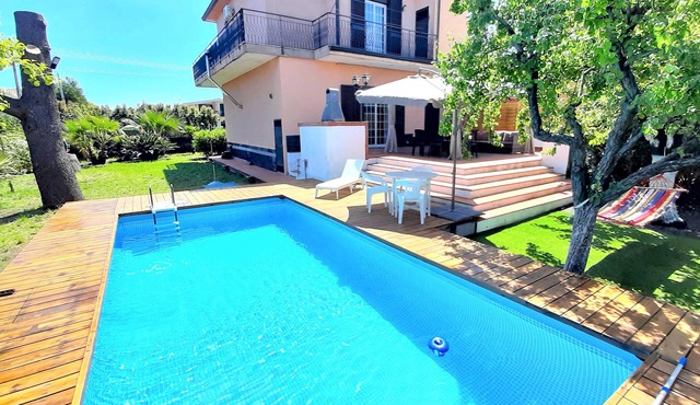 Villa Etna, with swimming pool and garden.