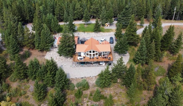 Walk out basement suite at the base of Tecumseh Mountain on 3 acres.