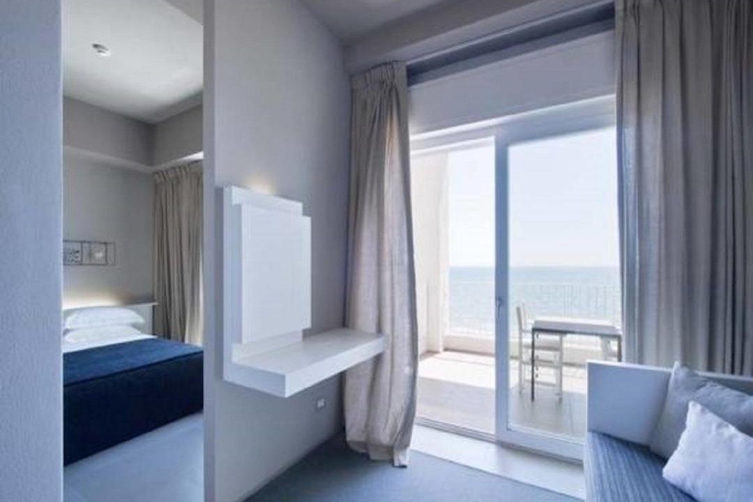 Photo of Bedroom in Lido di Capo Portiere