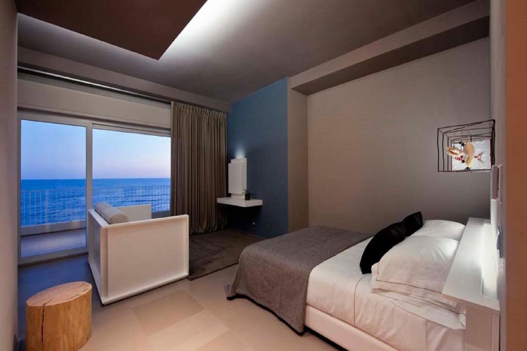 Photo of Bedroom in Lido di Capo Portiere