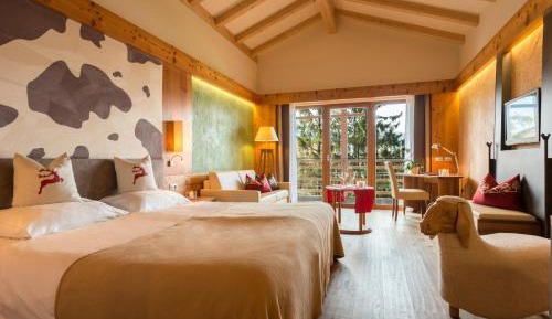 Junior Suite with Balcony and lateral village view