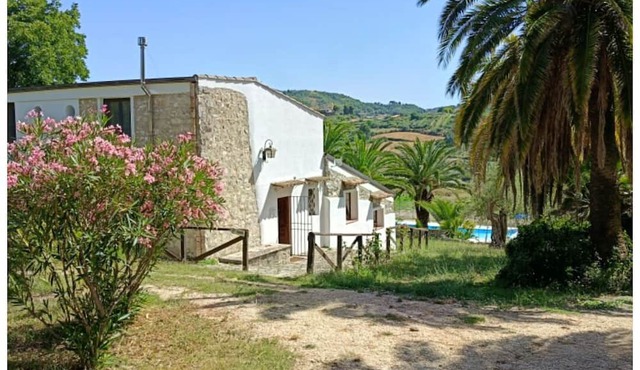 The historic Sicilian farmhouse nestled amid 7 hectares of organic olive groves